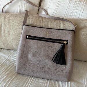 Elegant Taupe Handbag with Tassel Accent